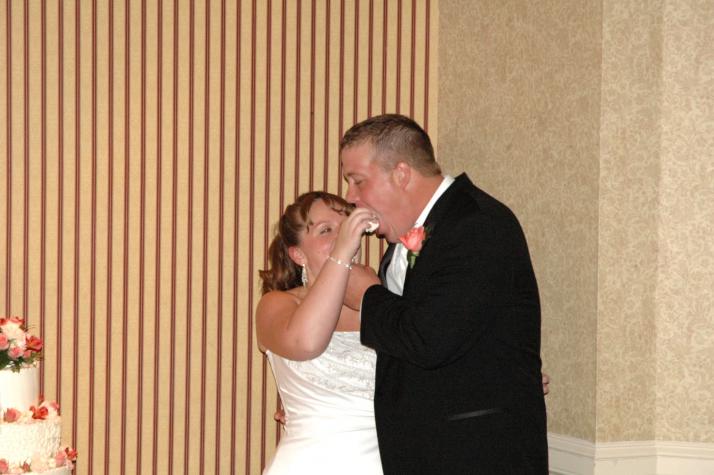 Clay and Kelley Feeding Each Other Cake - Baltimore, Maryland